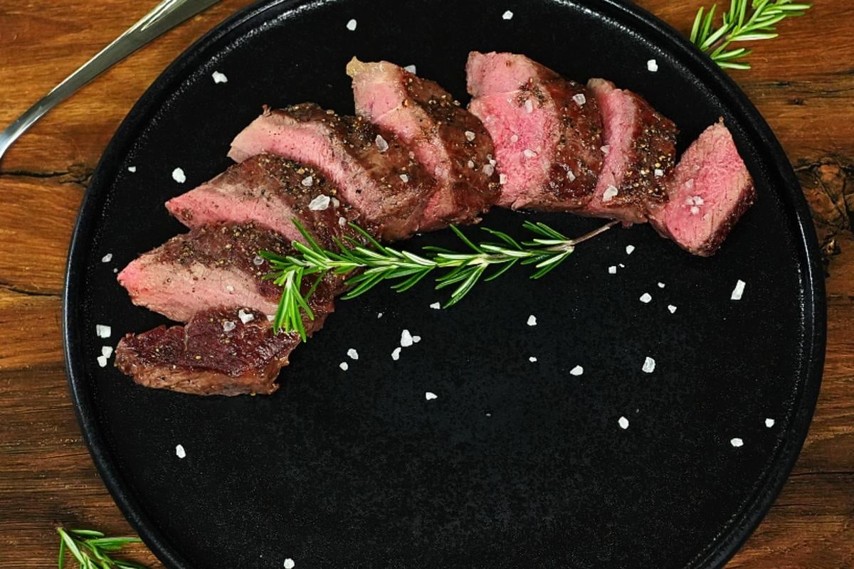 searing a steak in a pan