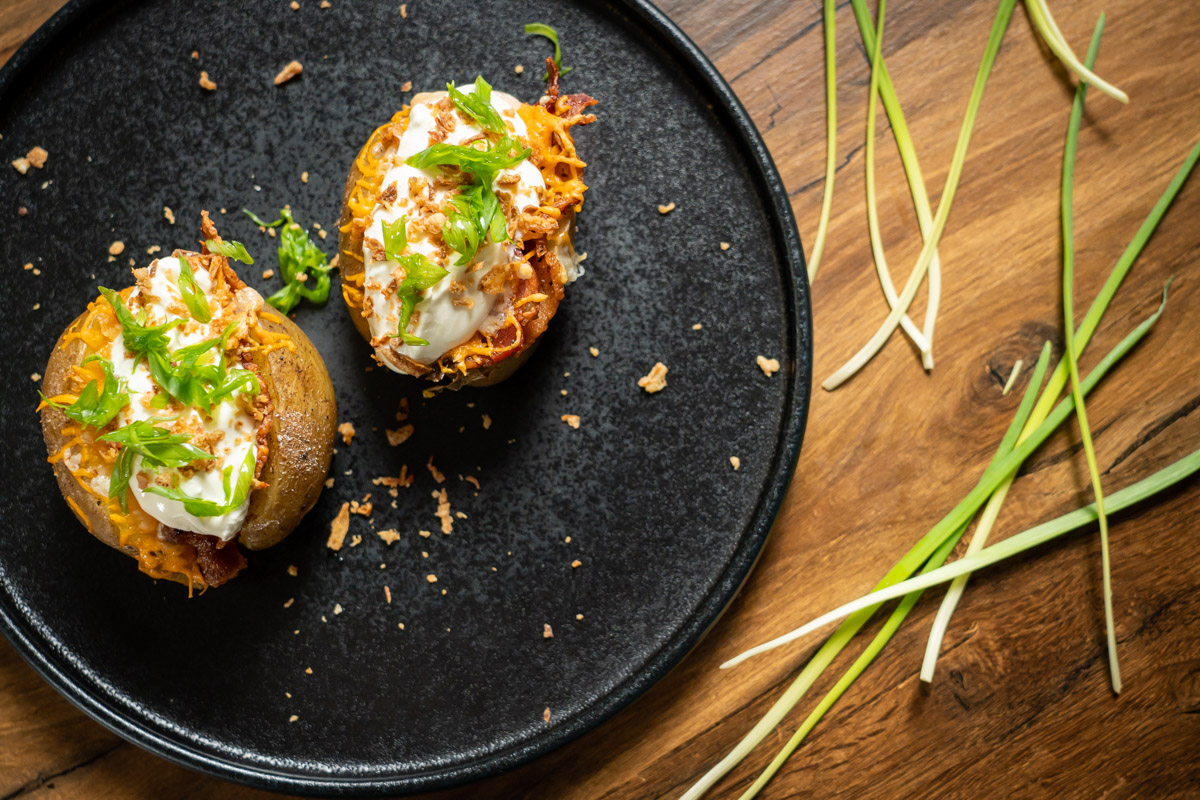 baked potato with cheese and bacon