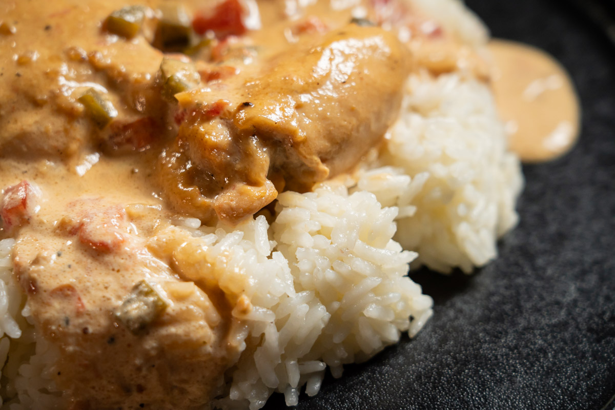 homemade chicken with rice in soy and cream sauce